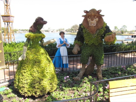 Belle with Beauty and the Beast topiaries in 2010 at EPCOT Flower & Garden Festival