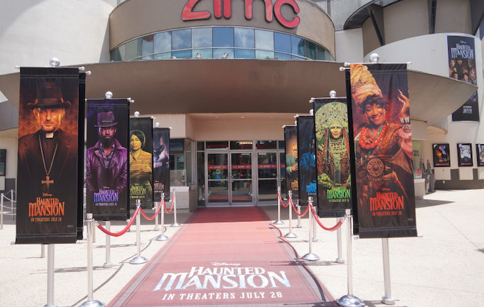 Haunted Mansion Red Carpet with Movie Banners at AMC Theatres Disney Springs